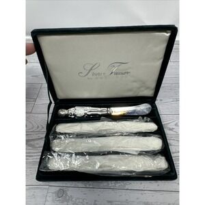Vintage Silver Plated Treasures by Godinger-Set of 4 Butter Knives Nutcracker